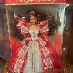 original Holiday Barbie dolls in their original packaging, never opened seal.